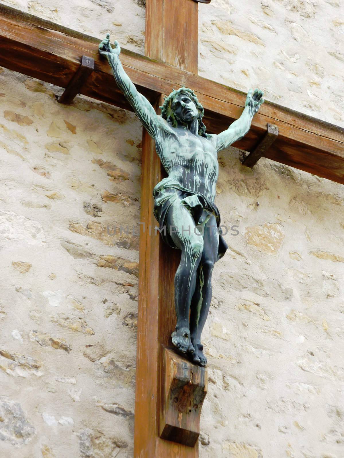 Jesus cross on a wall by Elenaphotos21