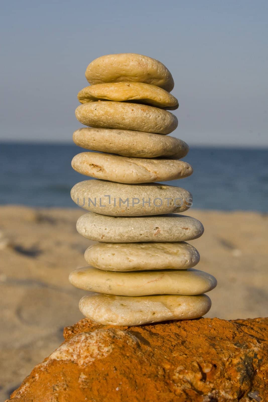 Nicely stacked tower of rocks on beach