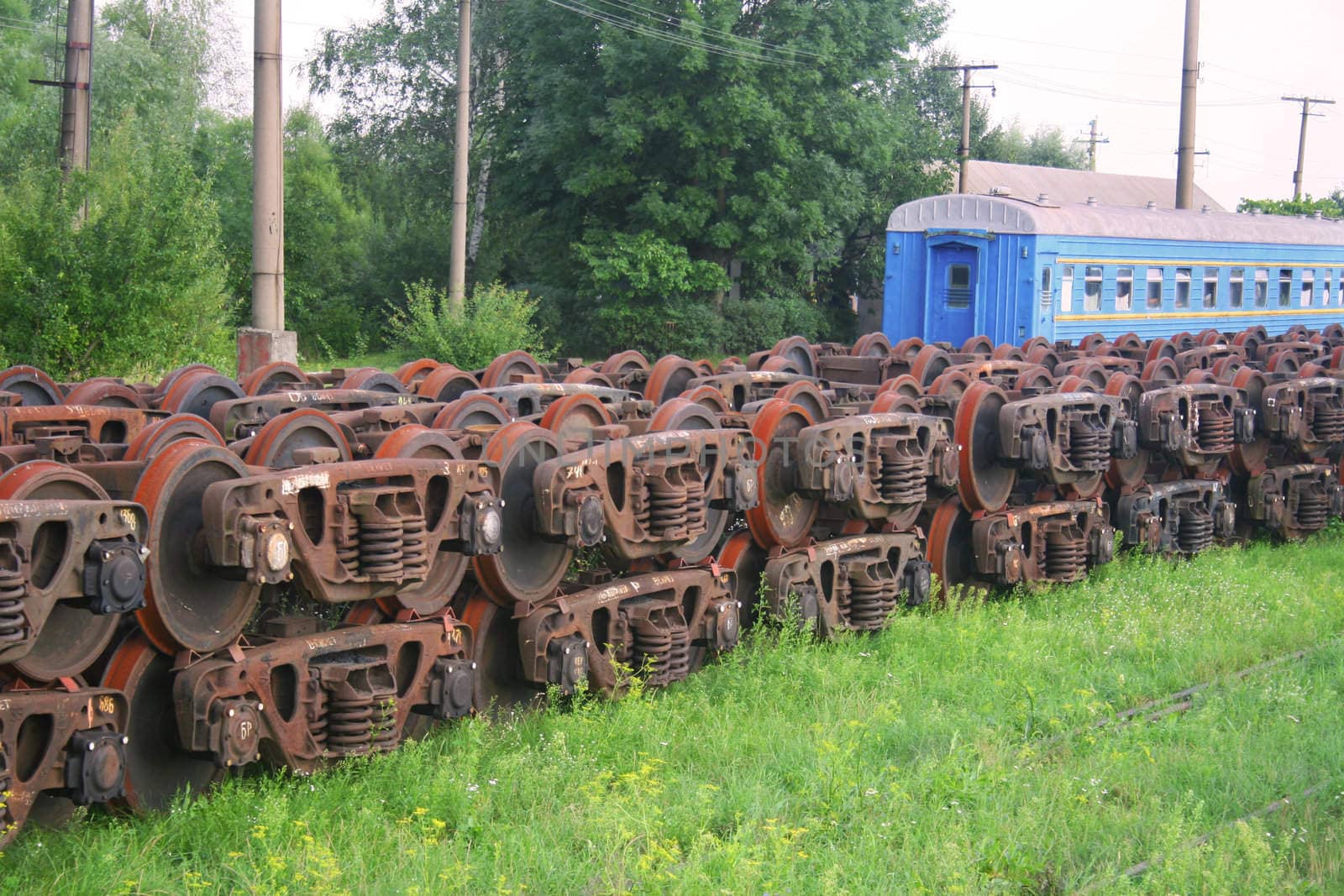 Stacked train wheels at train depot