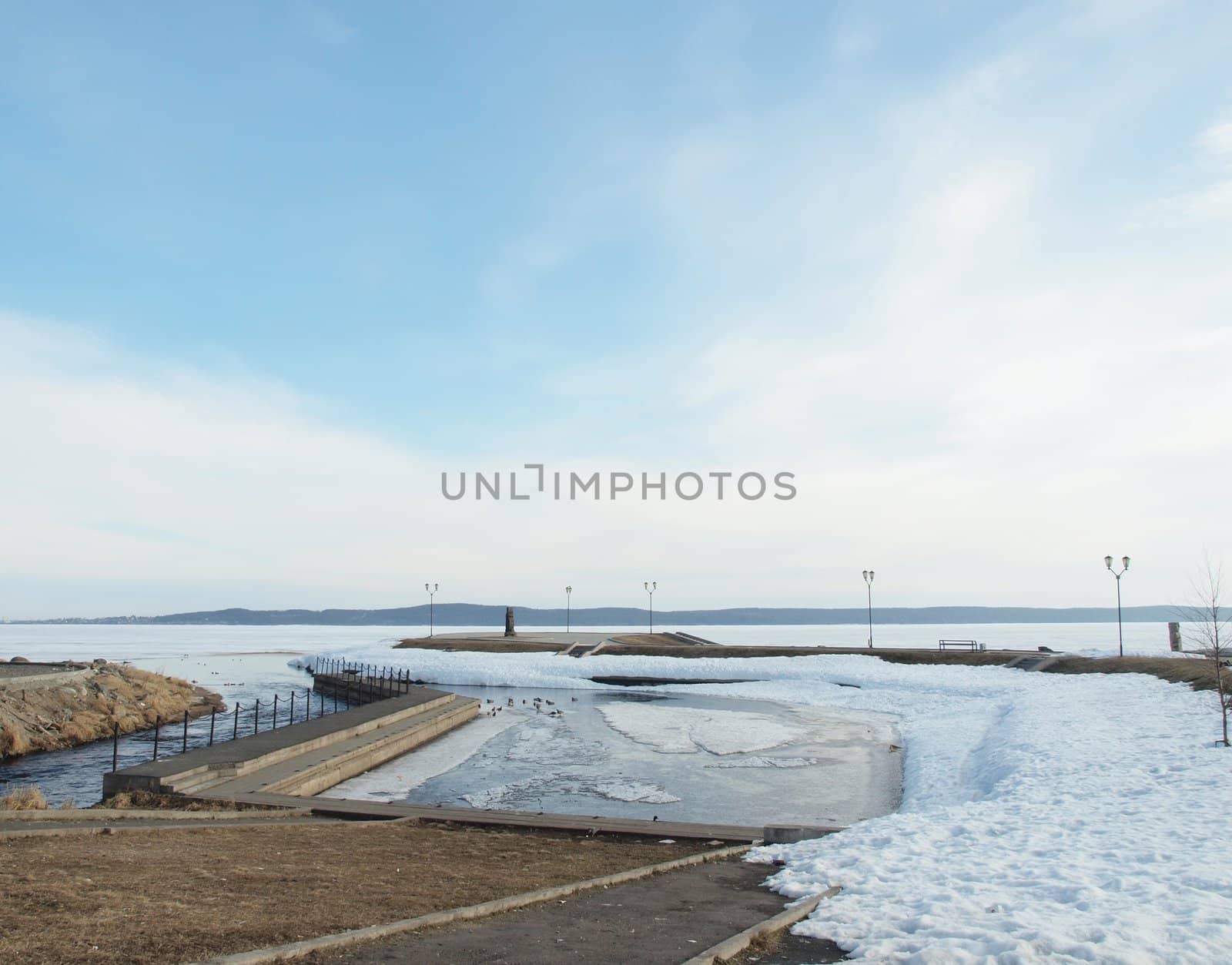 Quay of the Onega lake in the spring, Russia