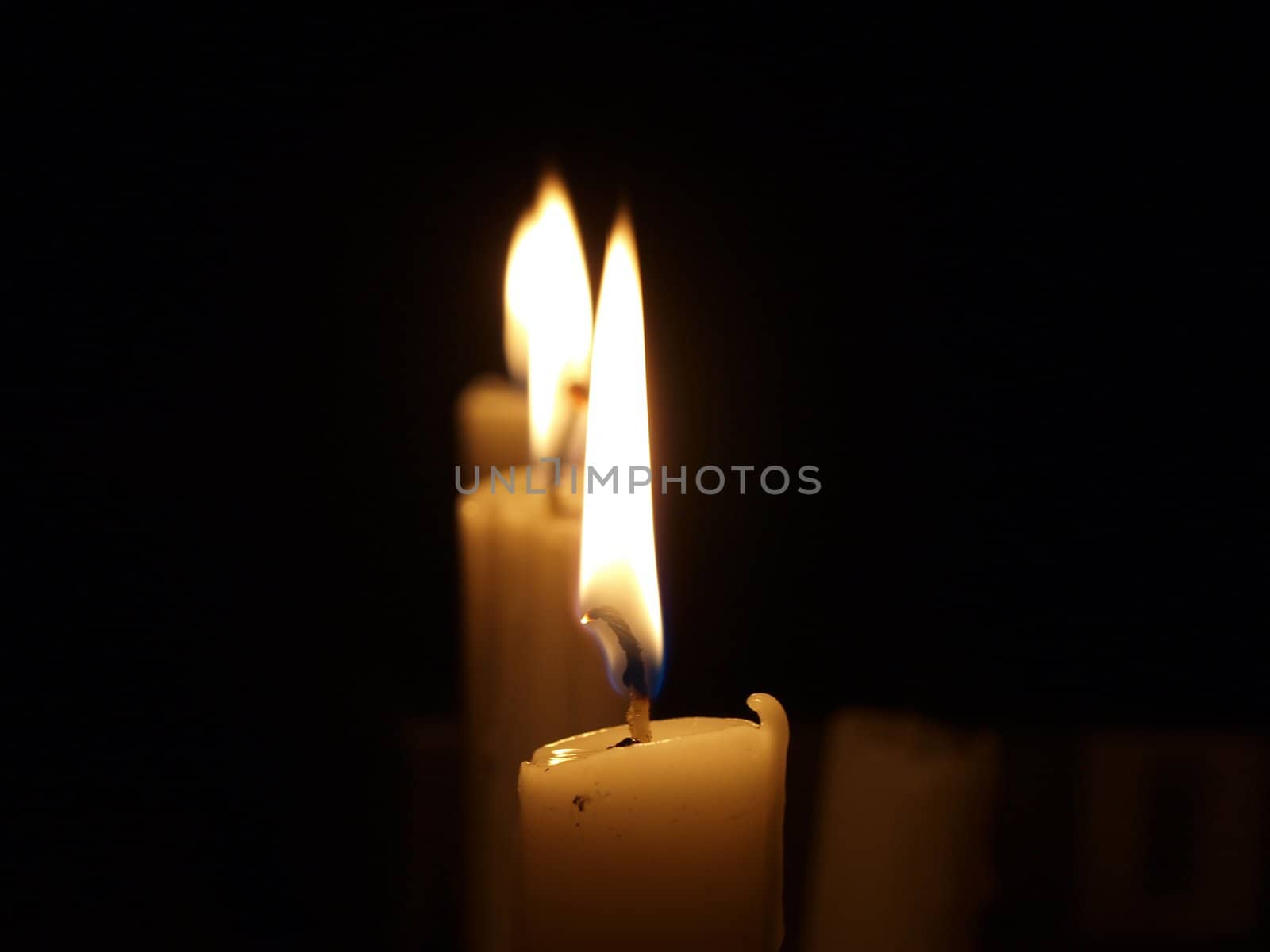 A number of burning candles