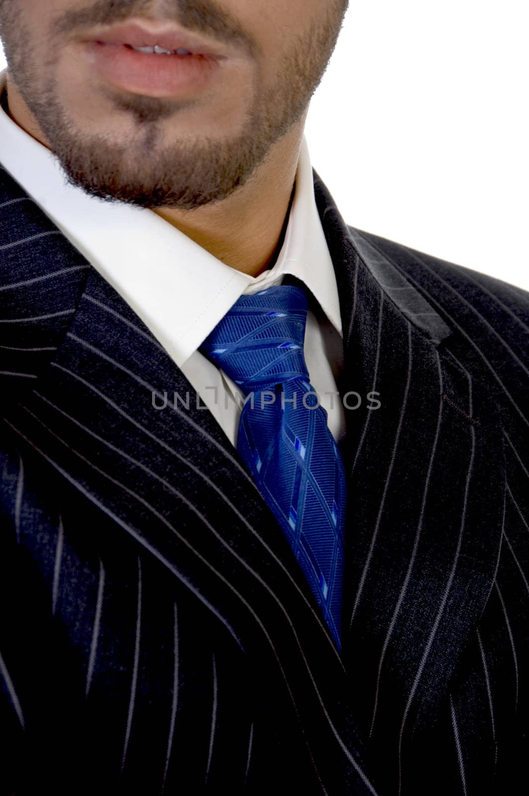 close up of businessperson's tie against white background