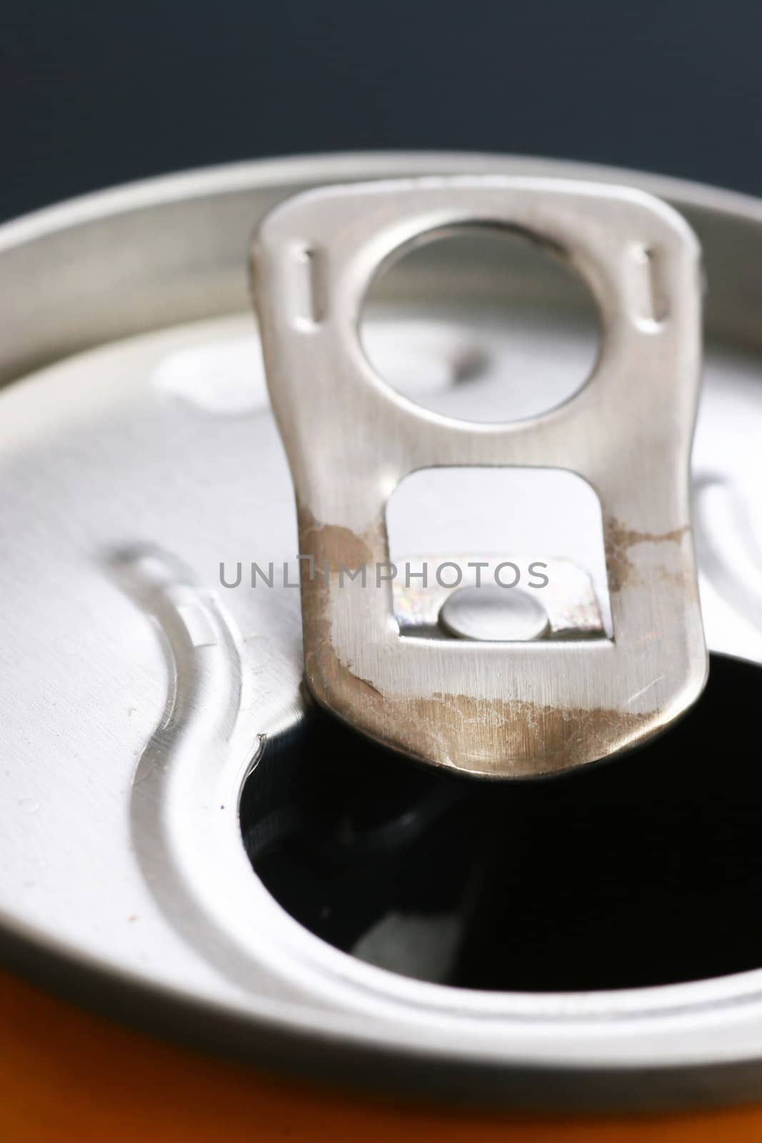 The aluminum can. A close-up, the top view