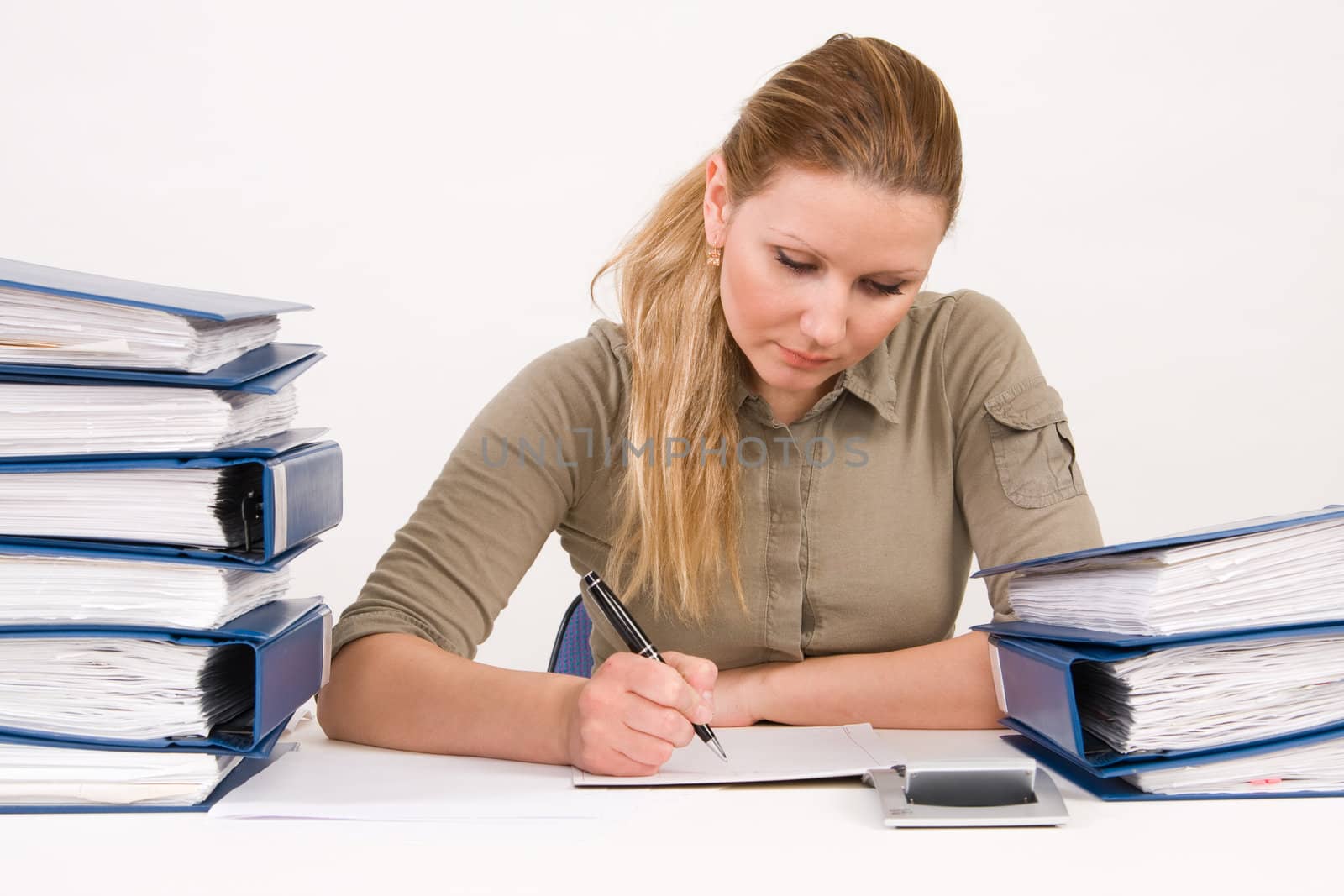 Confident business woman working with documents