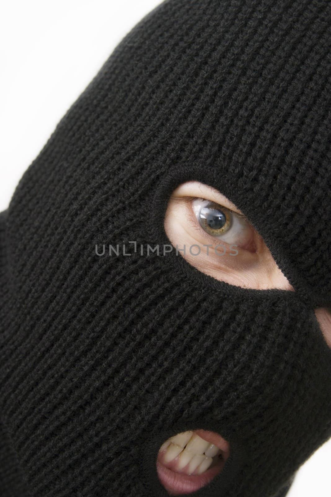 evil criminal wearing military mask