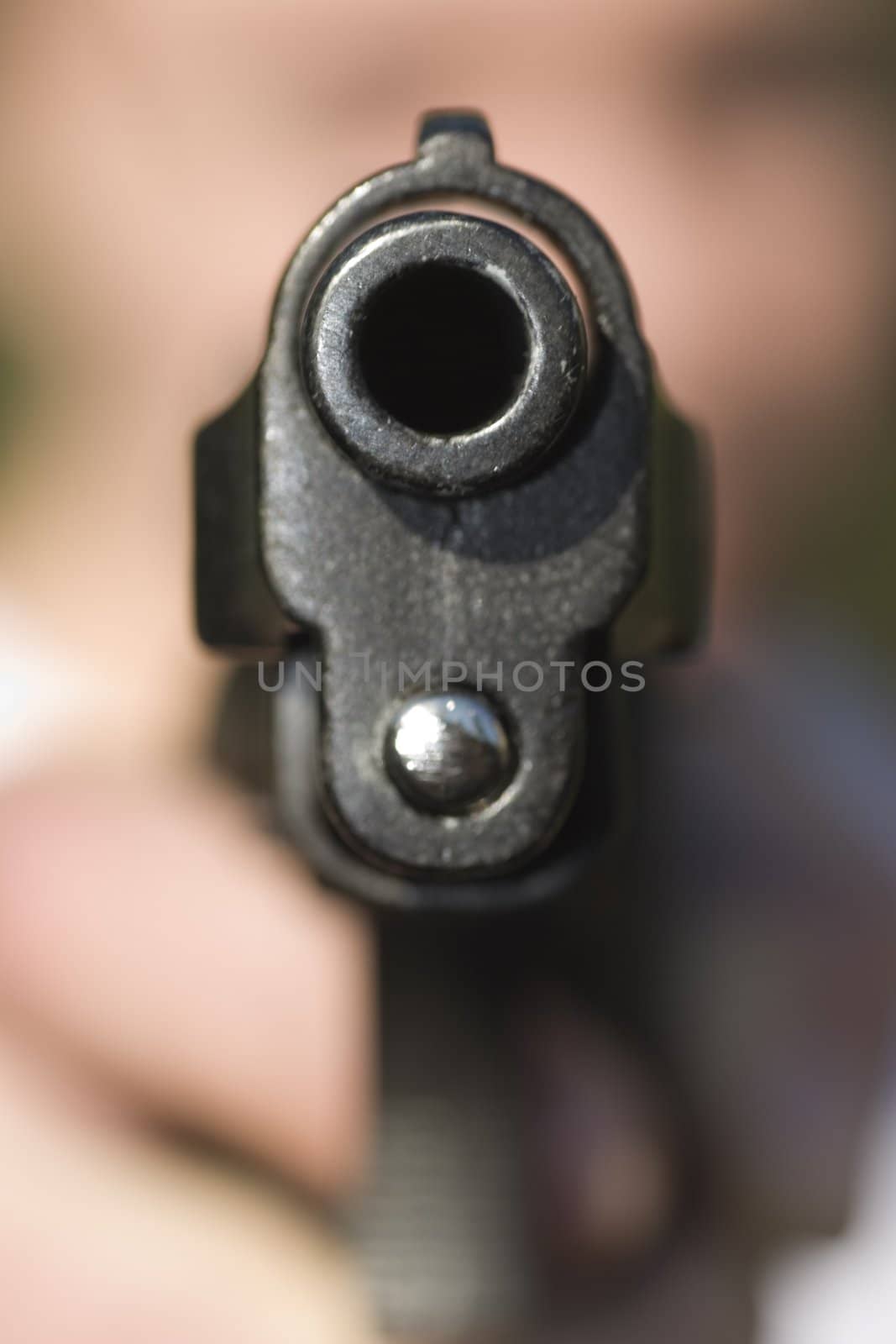 Pistol in a hand