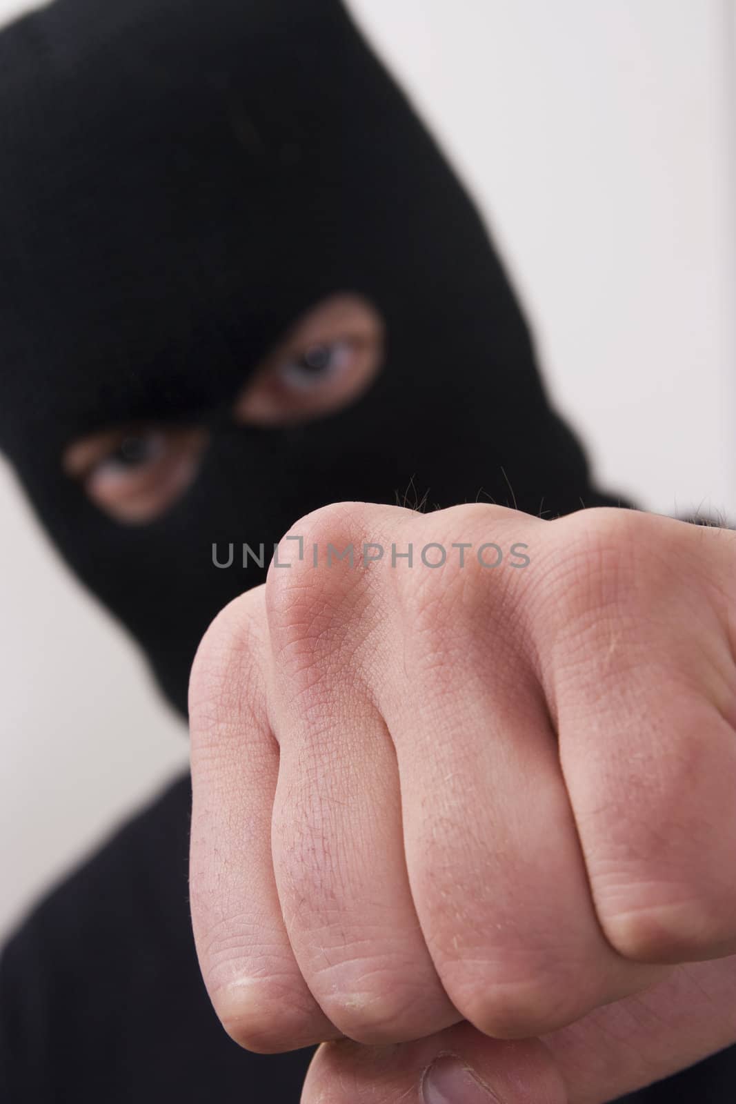evil criminal wearing military mask