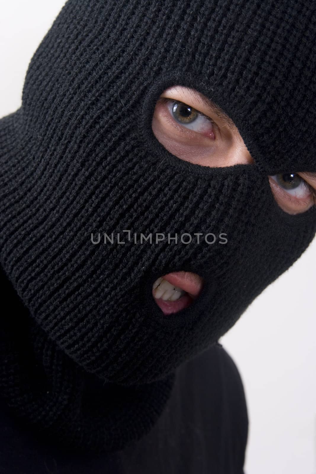 evil criminal wearing military mask