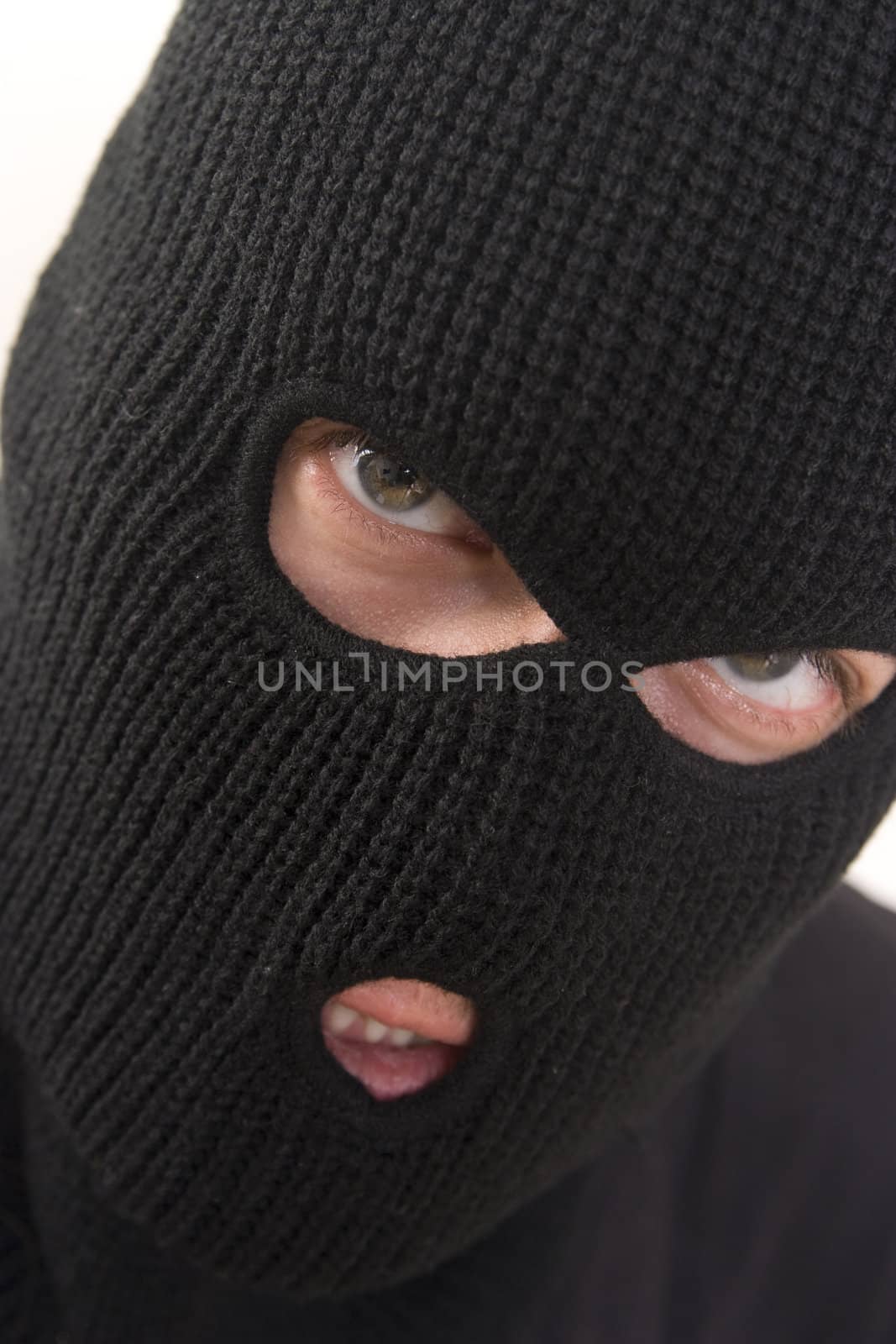 evil criminal wearing military mask