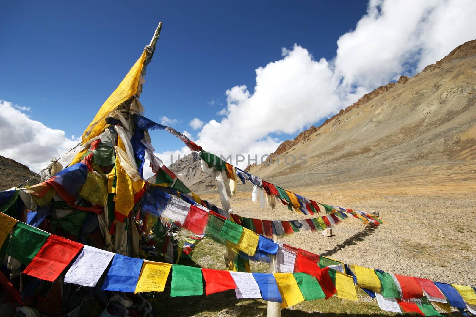Plenty of colorful Buddhist prayer flags on the road between Leh and Manali