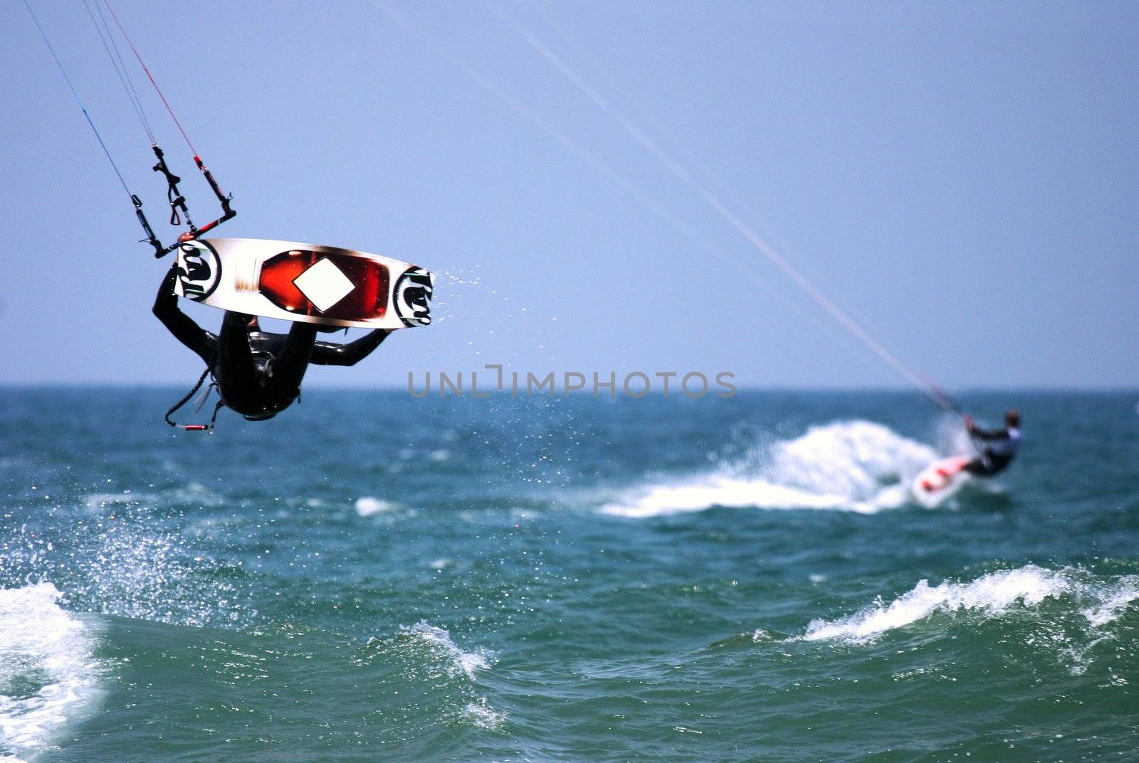 kite boarder / surfer flying through the air