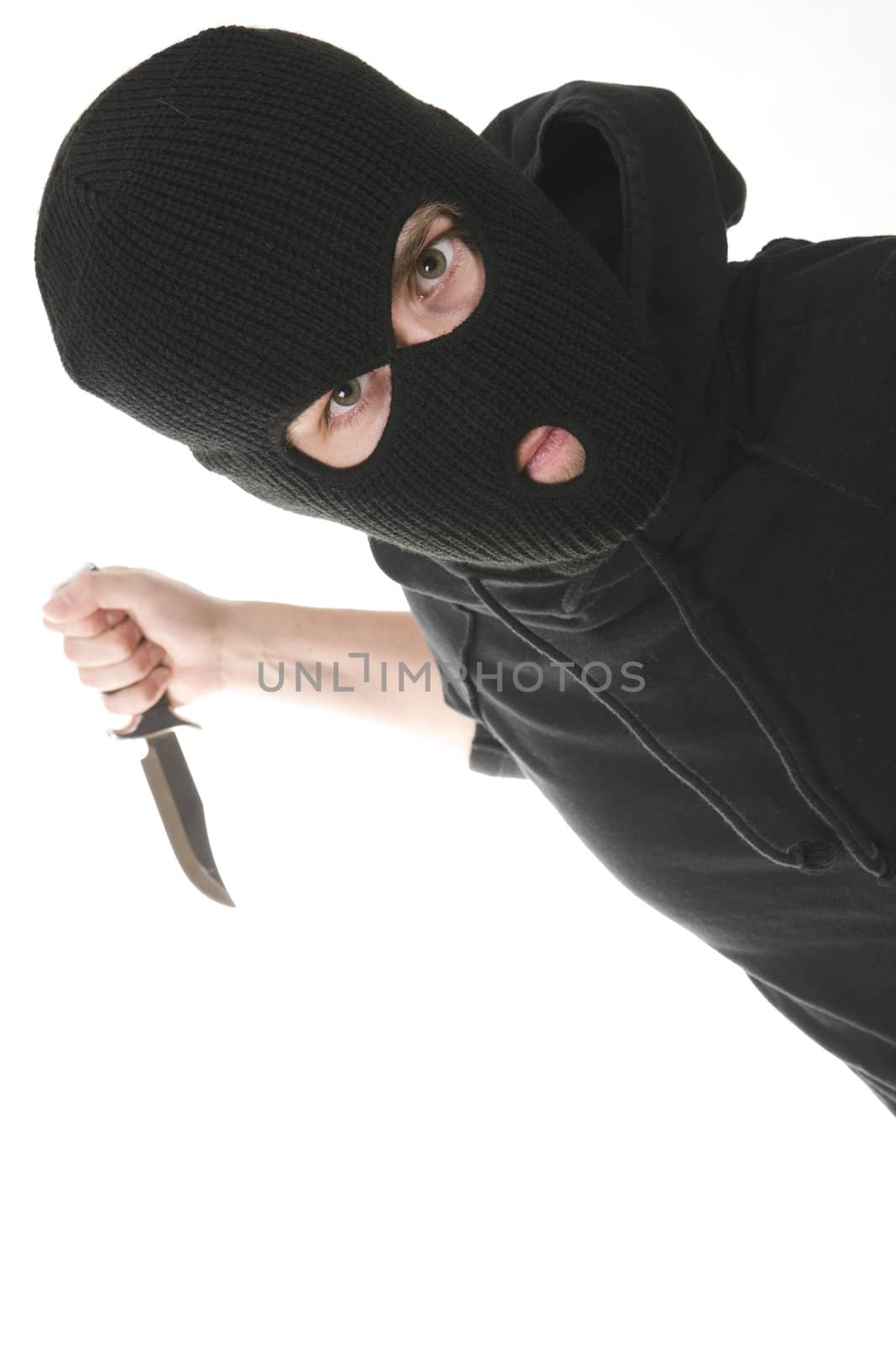 evil criminal wearing balaclava with a knife