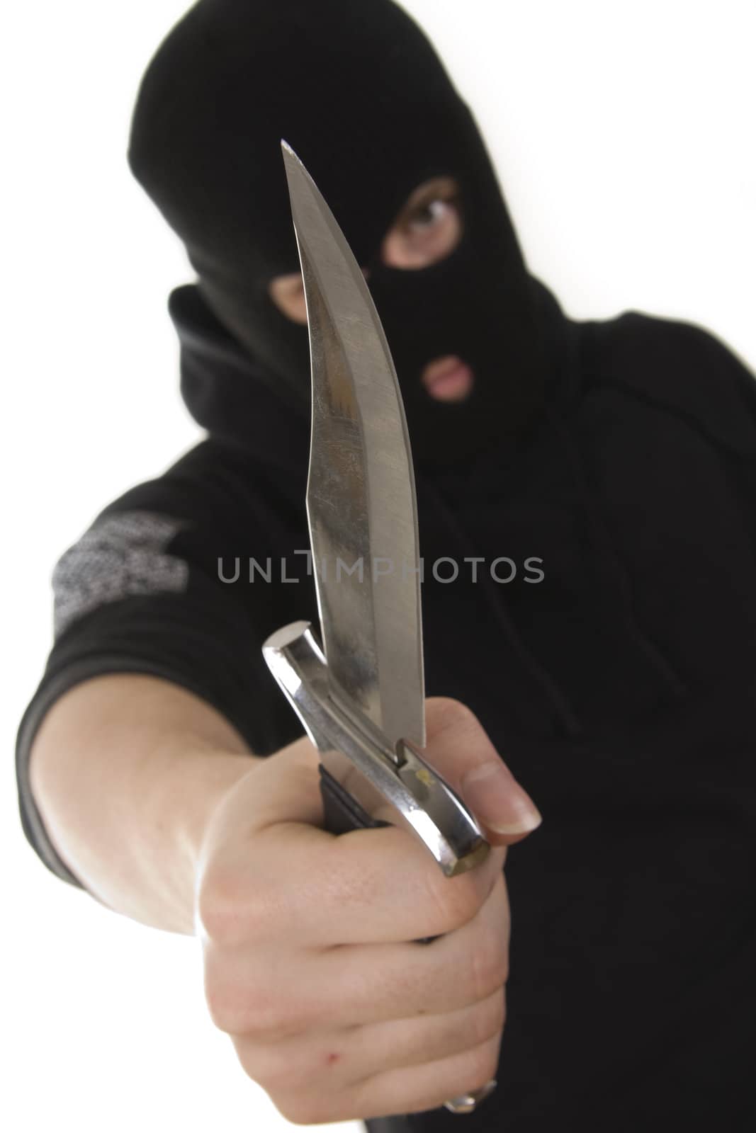 evil criminal with a knife wearing balaclava