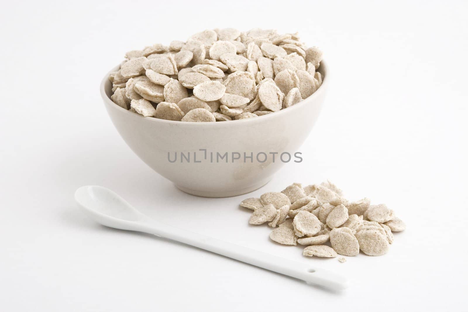 front view of cereals bowl on white background