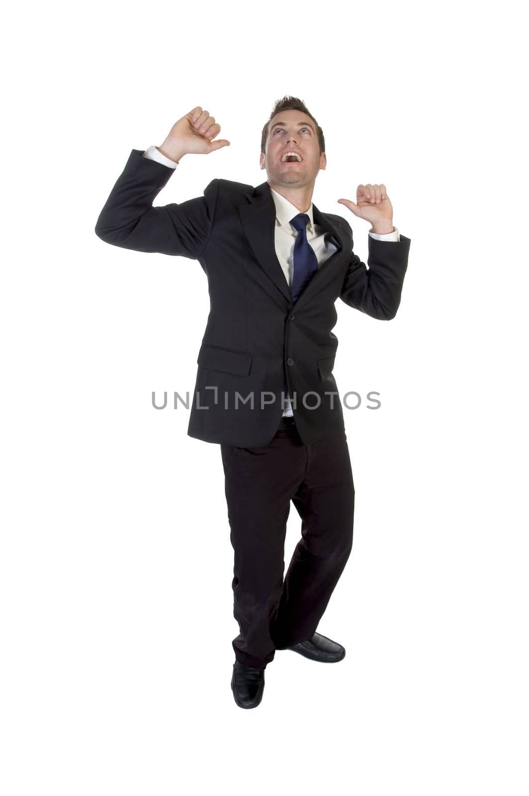 a young handsome businessman celebrating a success on an isolated white background