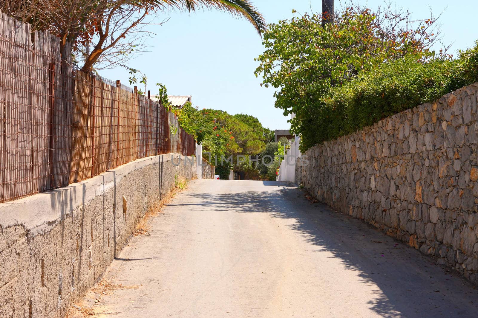 A narrow street in the village on the island of Crete. Greece by alexanderd