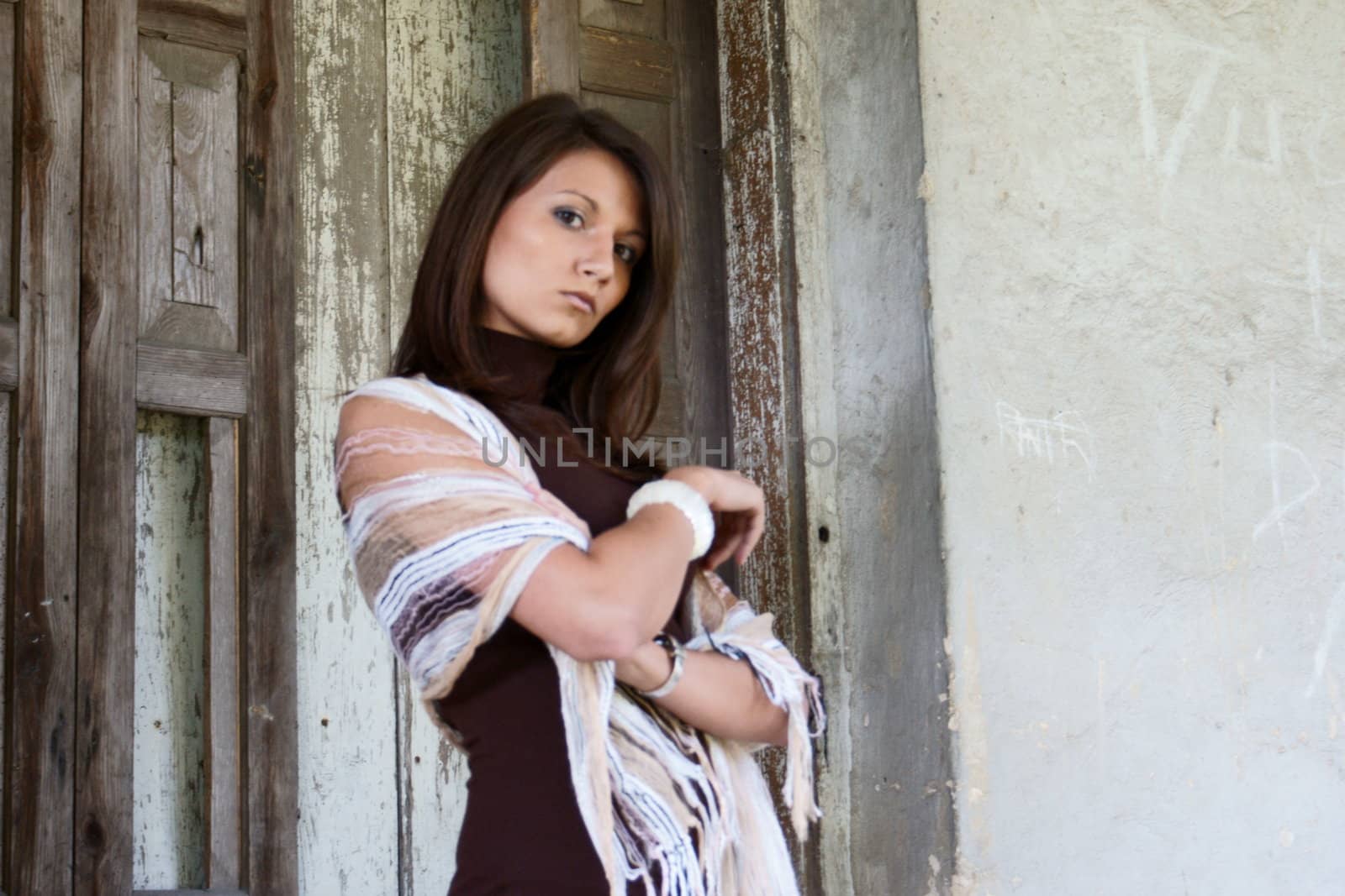 Young girl from Poland in old, cut manor house