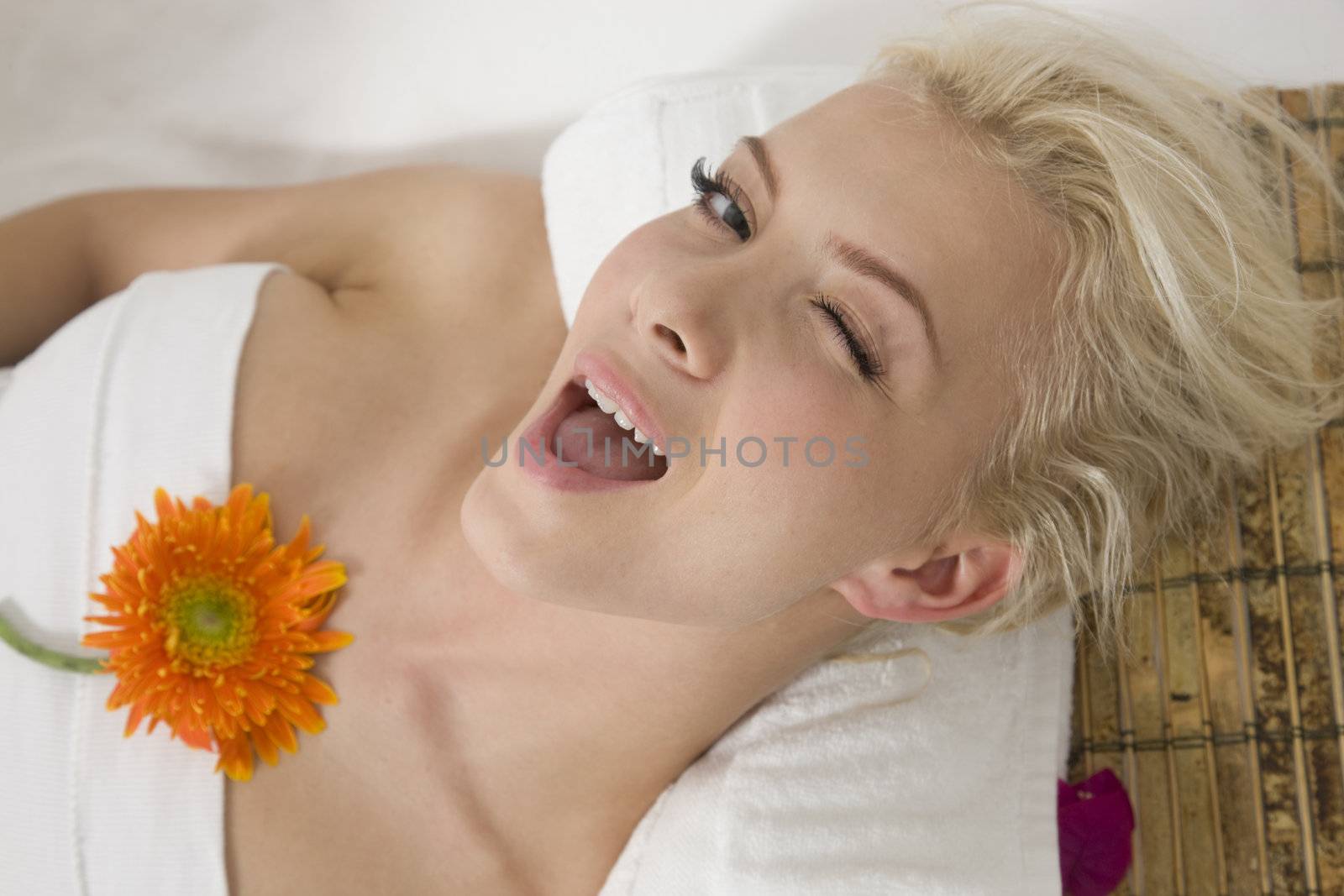 beautiful woman with flower on isolated background