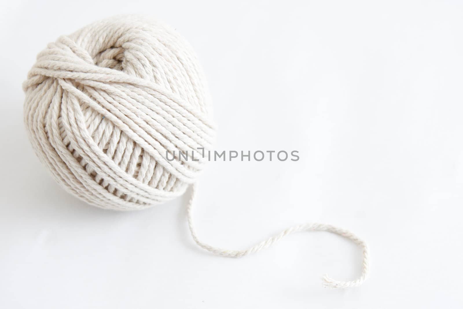 White thread on a white background