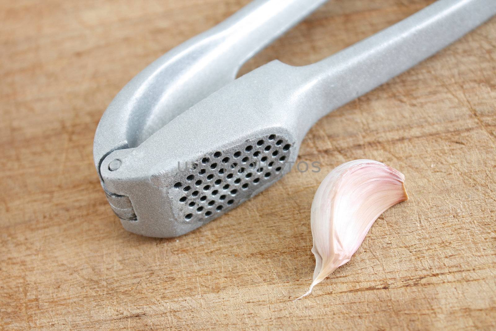 Fresh garlic on a wooden background