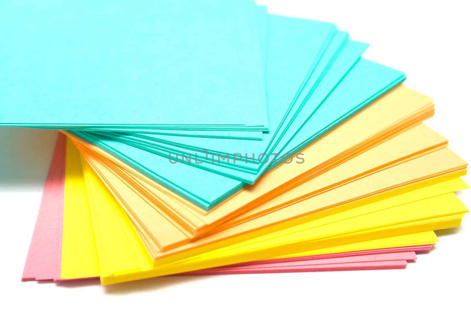 Pile of a pure paper for notes on a white background. Isolation, shallow DOF