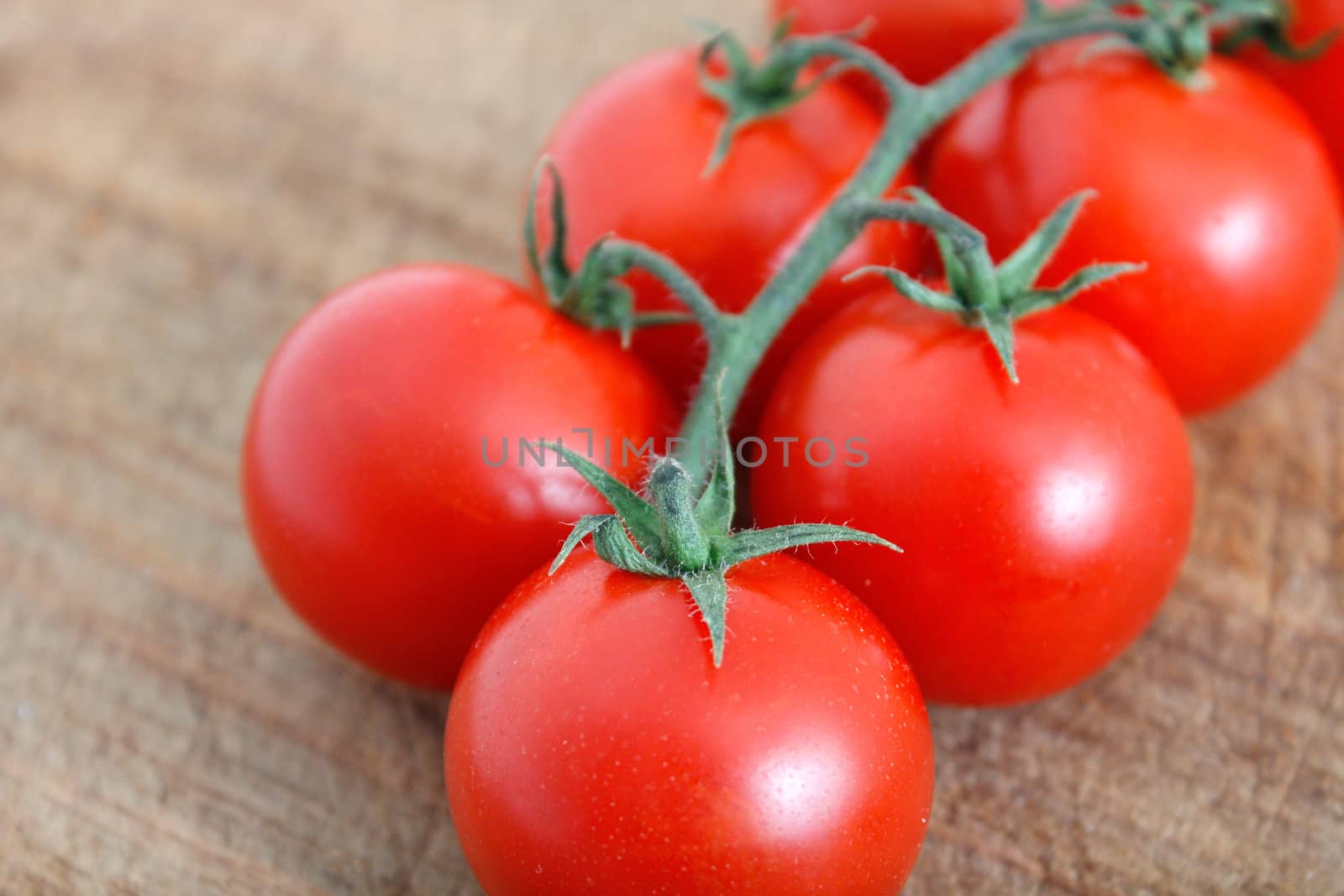 Delicious tomatoes on a chopping board