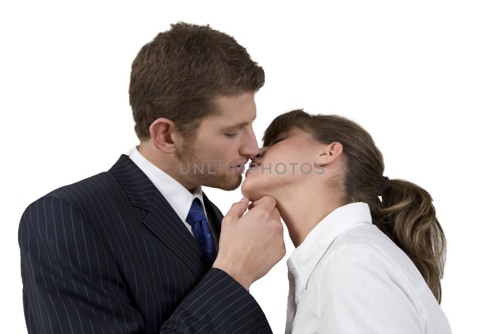 kissing pose of couple on isolated background