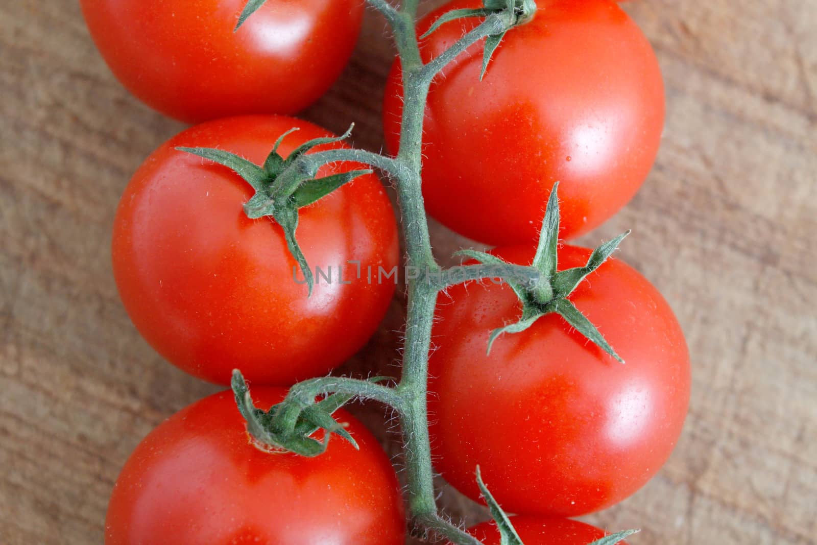 Delicious tomatoes on a chopping board