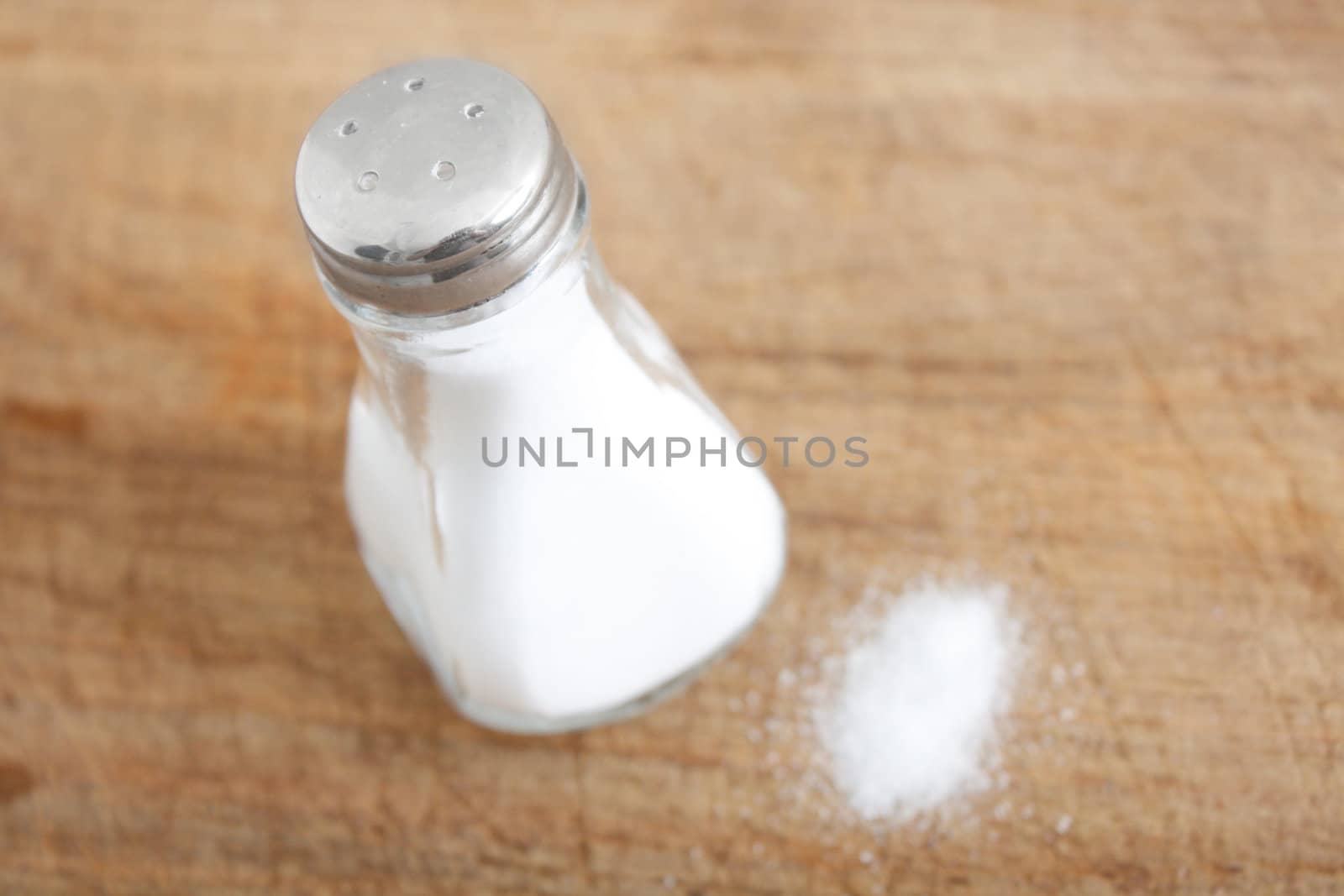 Salt on a wooden surface