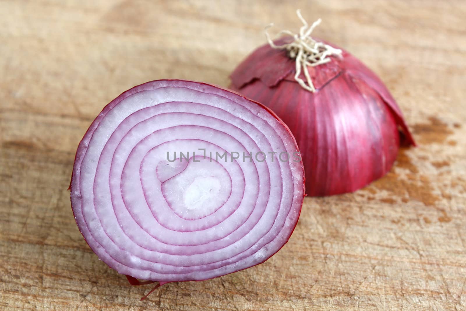 A red onion sliced in half