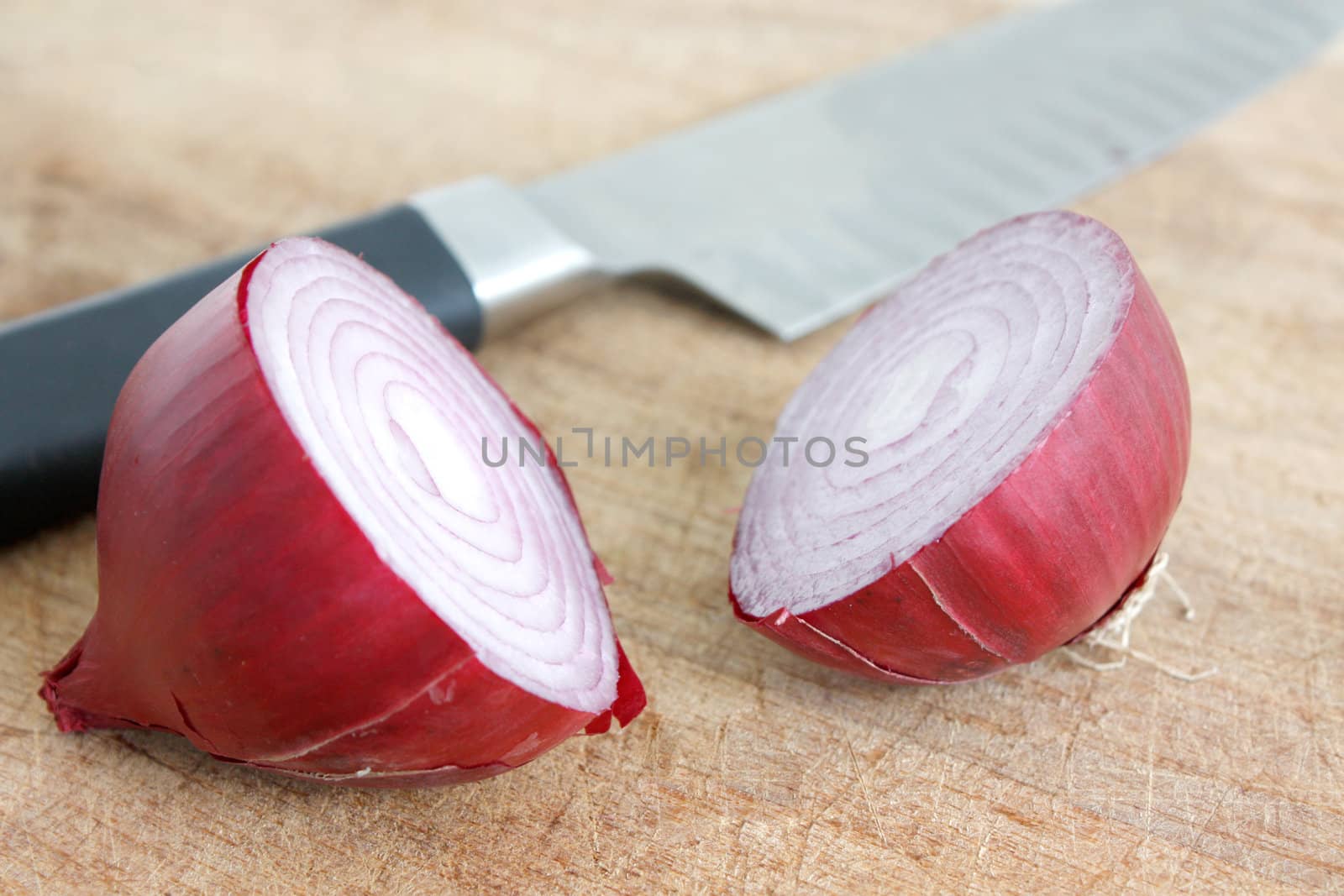 A red onion sliced in half