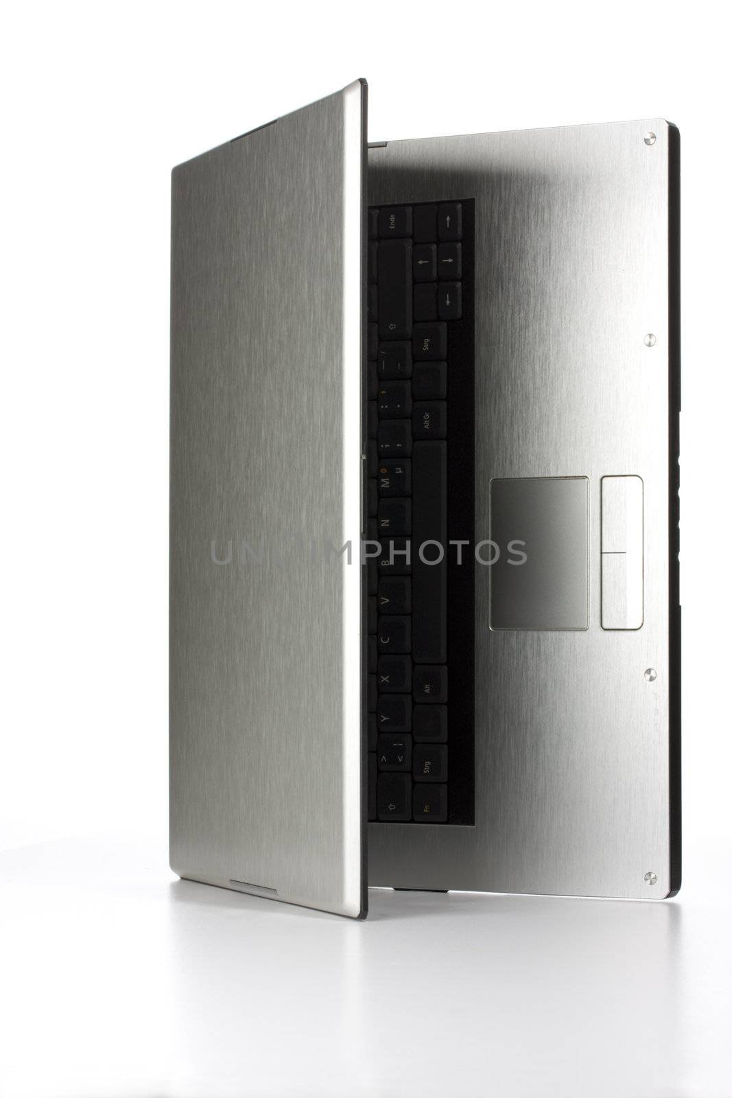 aluminium notebook computer on white background by bernjuer