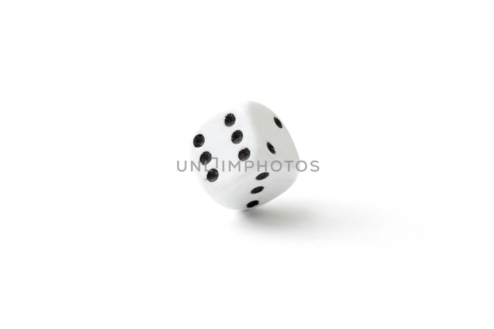 A dice in a studio
