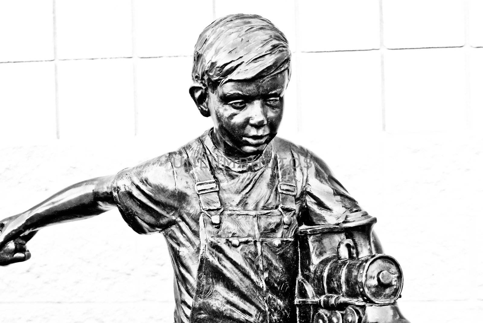 Bronze Boy Playing With Train by RefocusPhoto