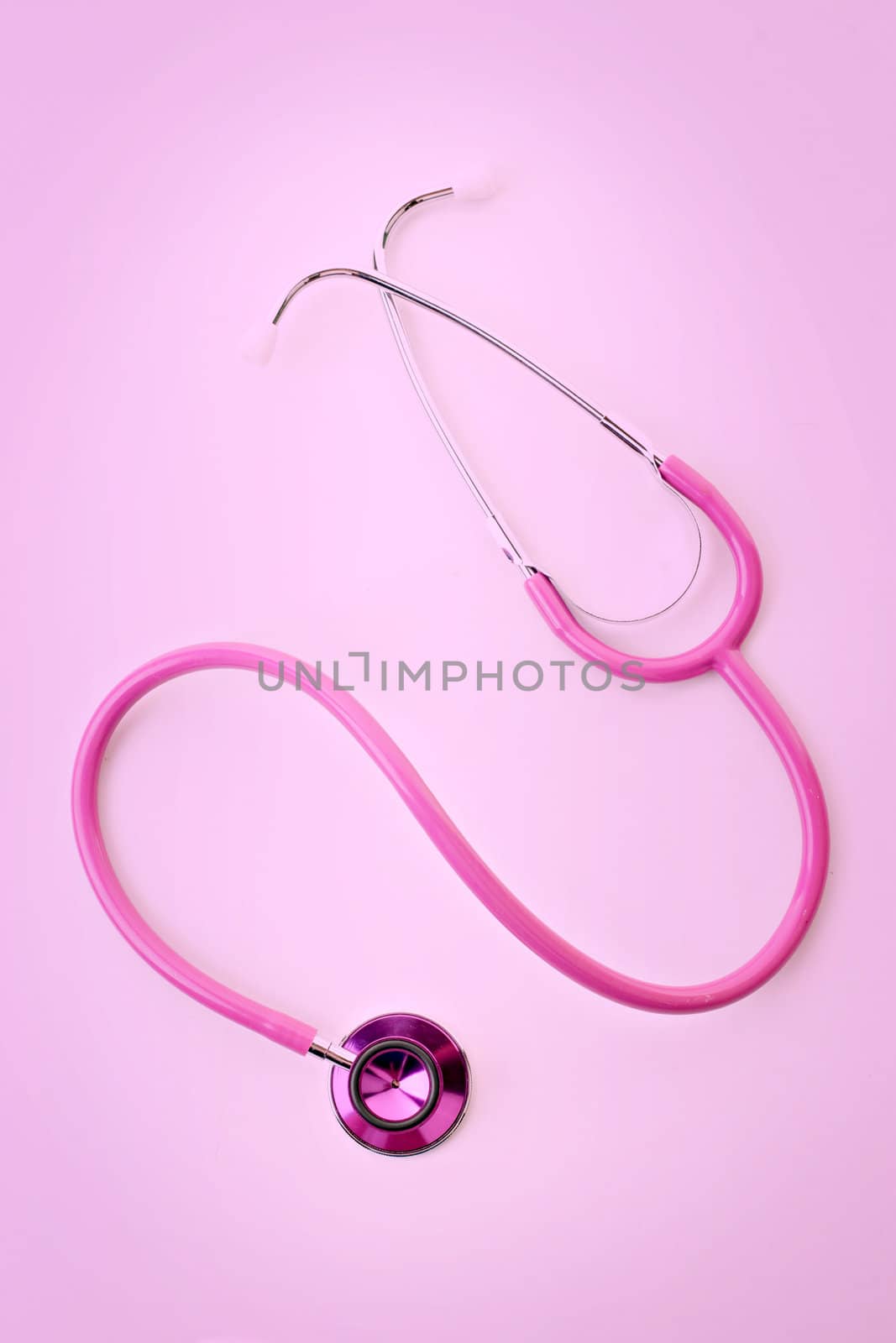 great image of pink stethoscope on pink