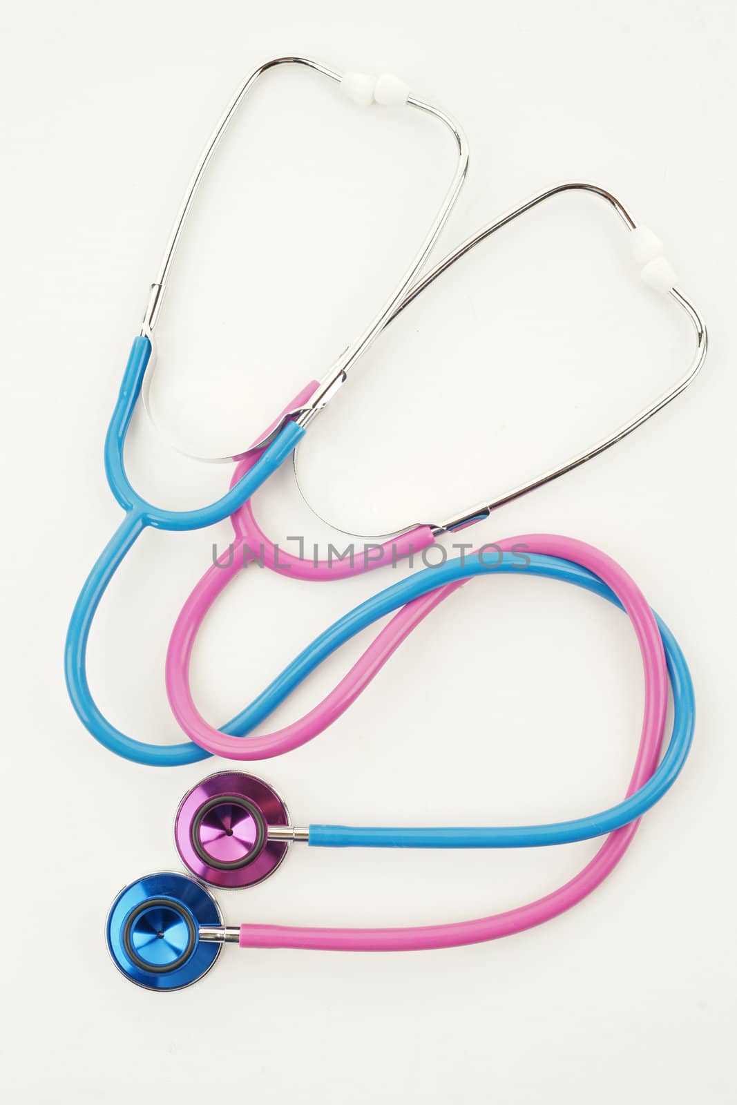 great image of pink and blue stethoscopes