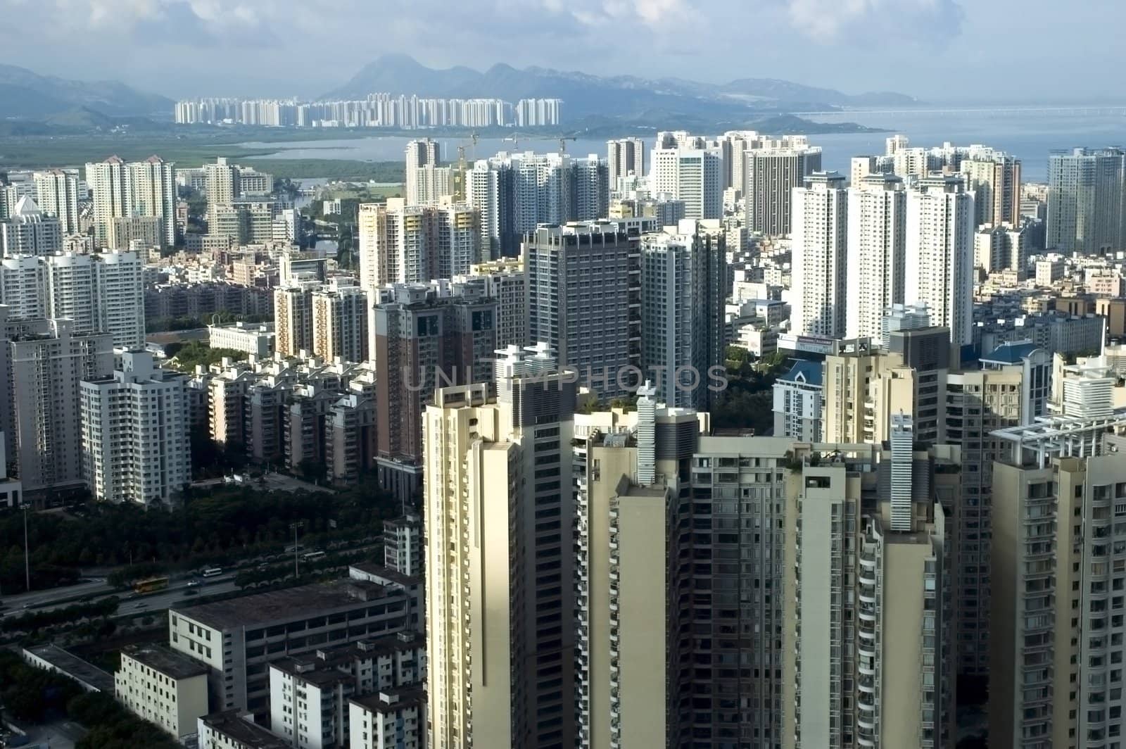 Chinese metropolis - Shenzhen, modern city full of skyscrapers, office buildings, hotels and residential areas.