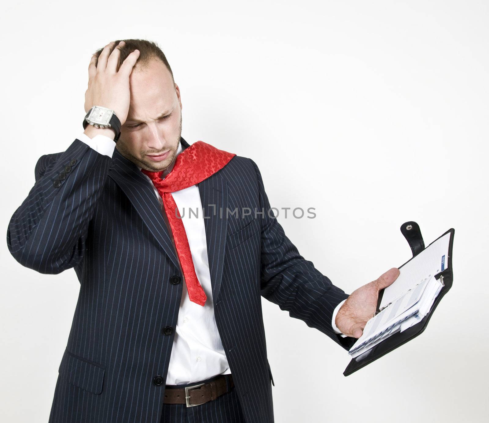 businessman in tension with folder
