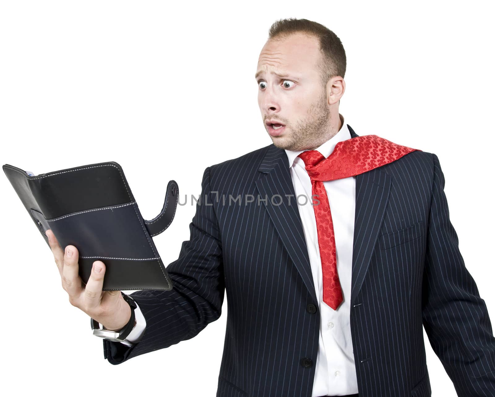 businessman in shock on isolated background
