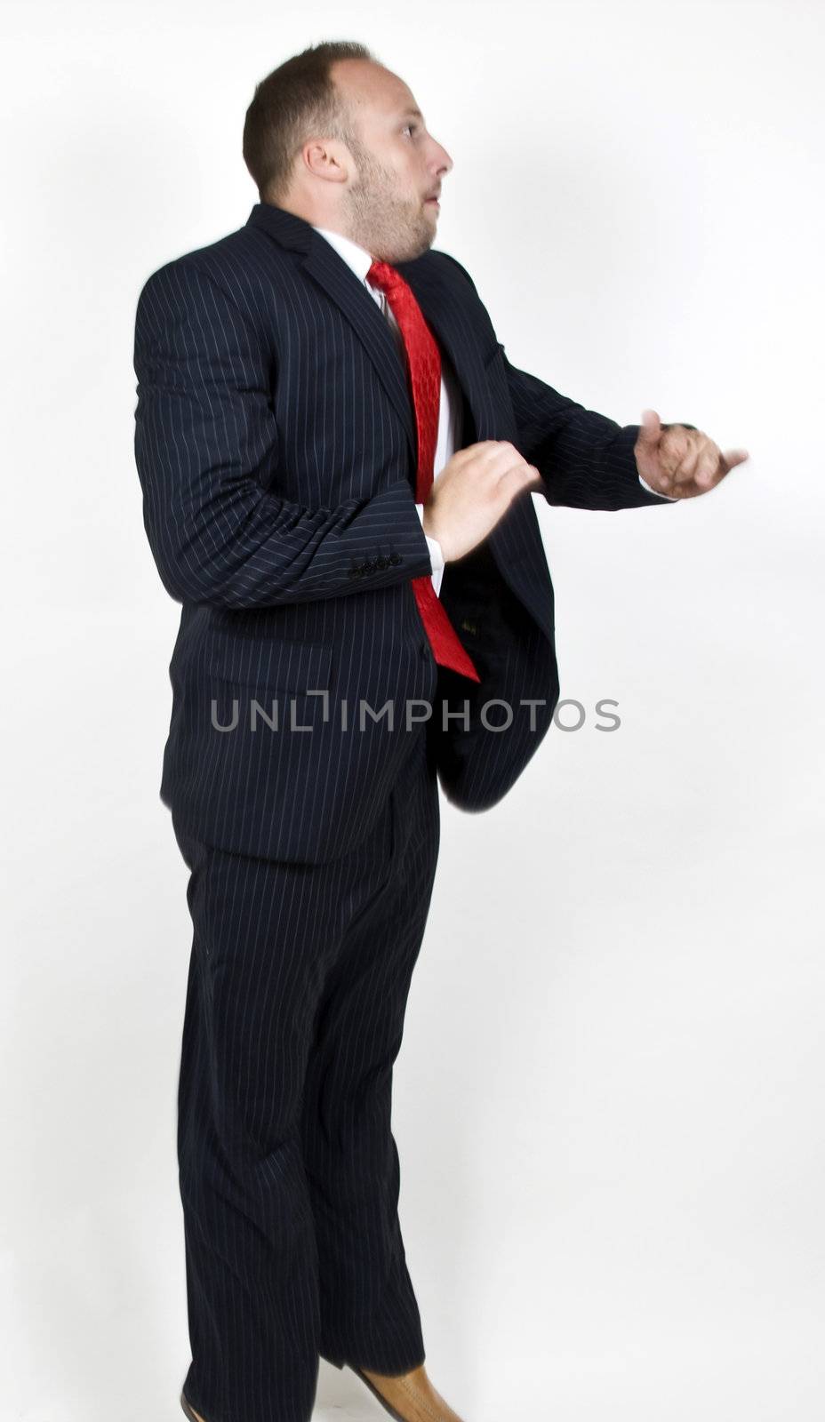 man in dancing pose on isolated background
