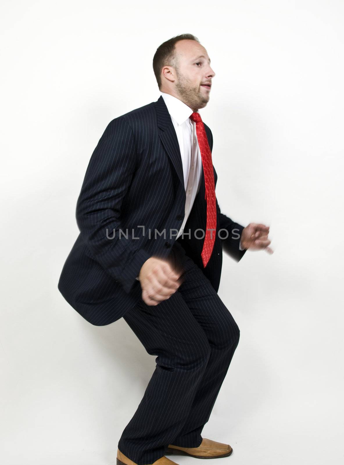 male in jumping mode on isolated background
