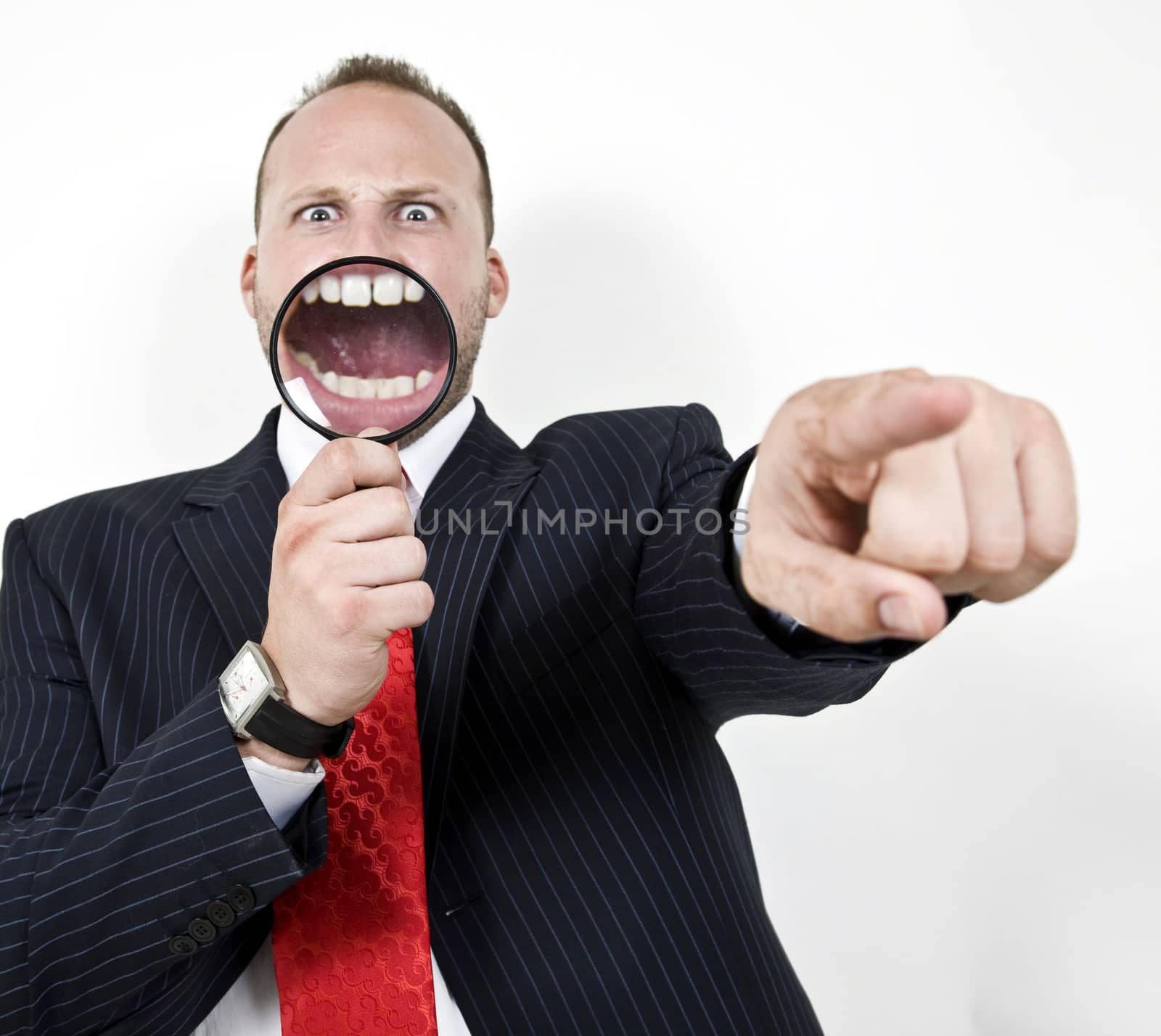 pointing man with magnified glass on isolated background
