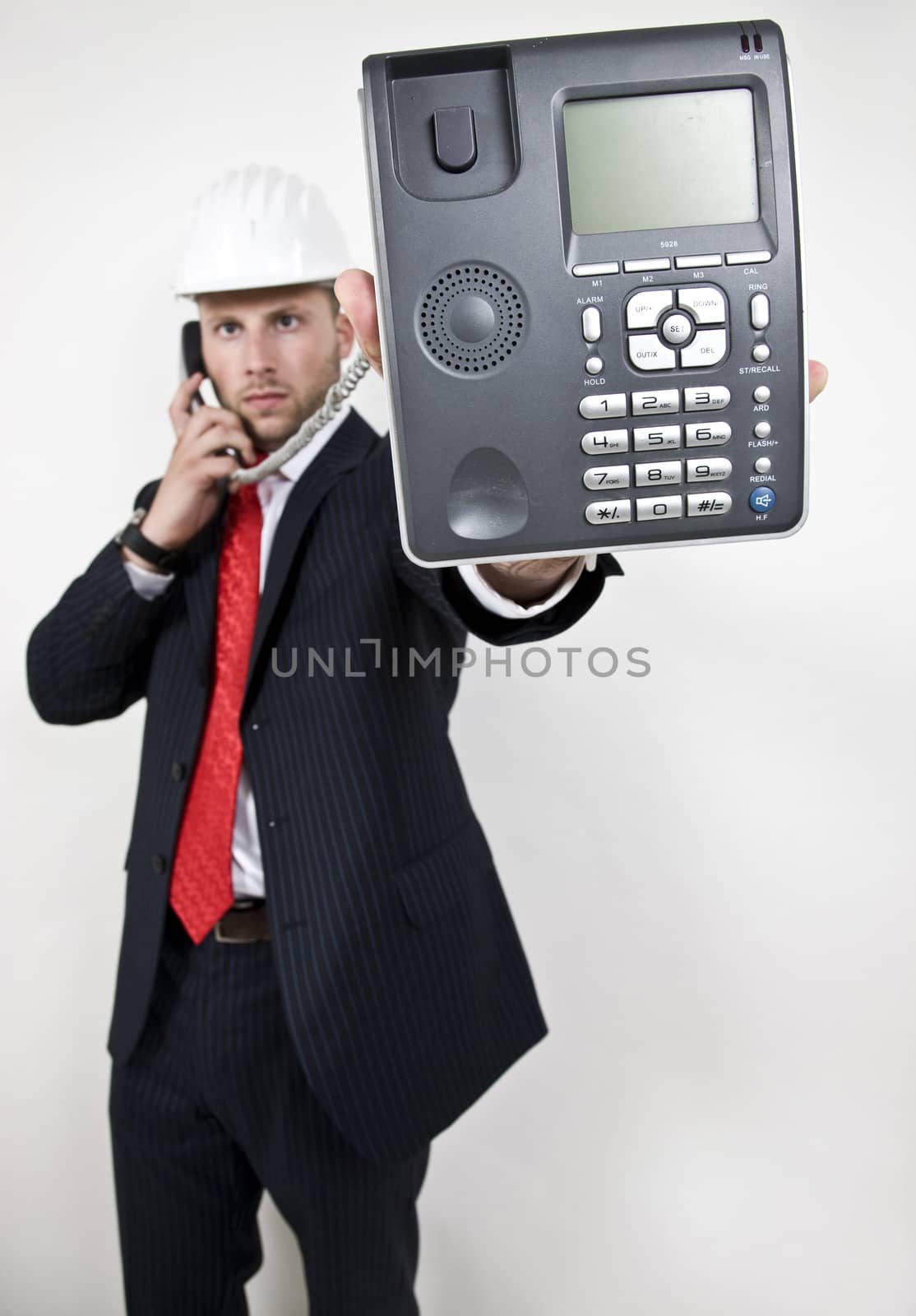 male displaying phone on isolated background
