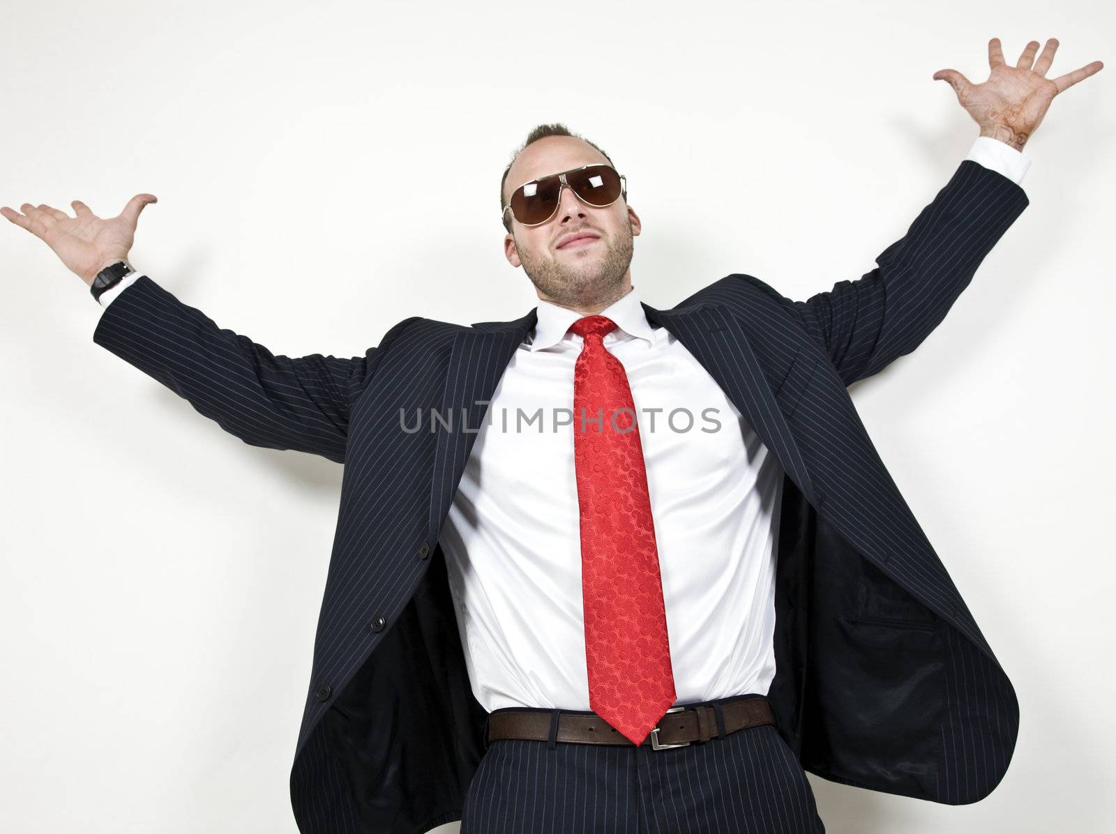 male spreading his hands on isolated background
