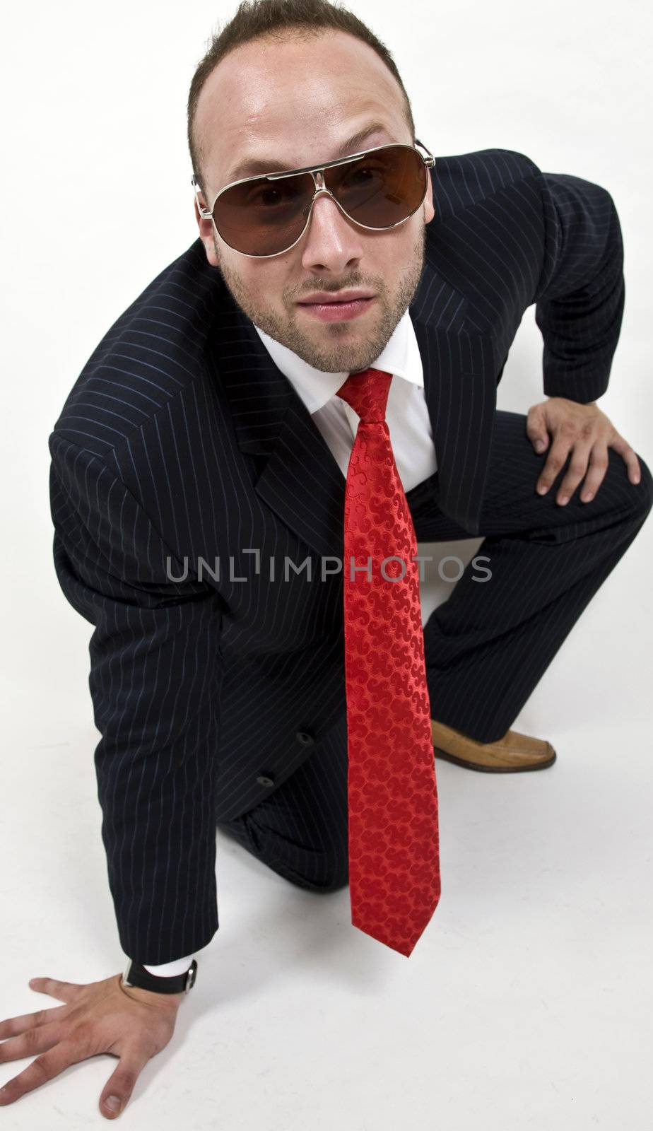 sitting man with eye wear on isolated background
