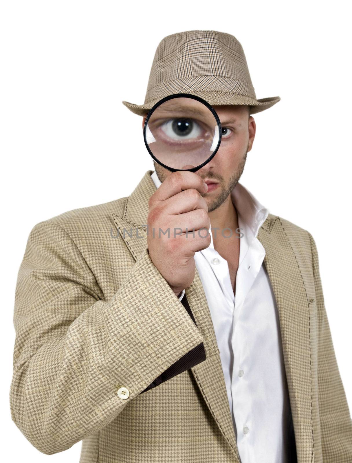 male investigating with magnifying glass
