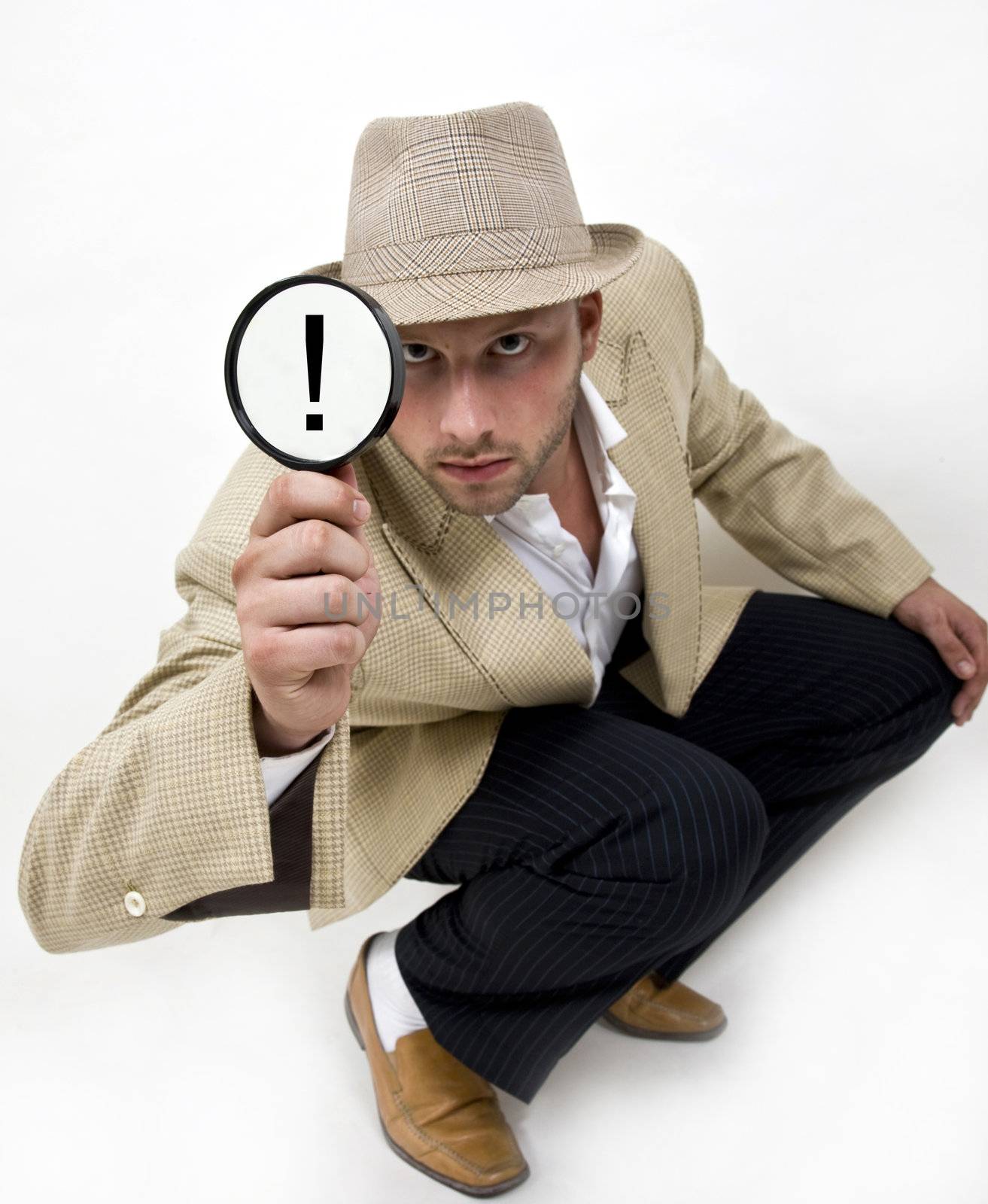 spying man with magnifying glass on isolated background
