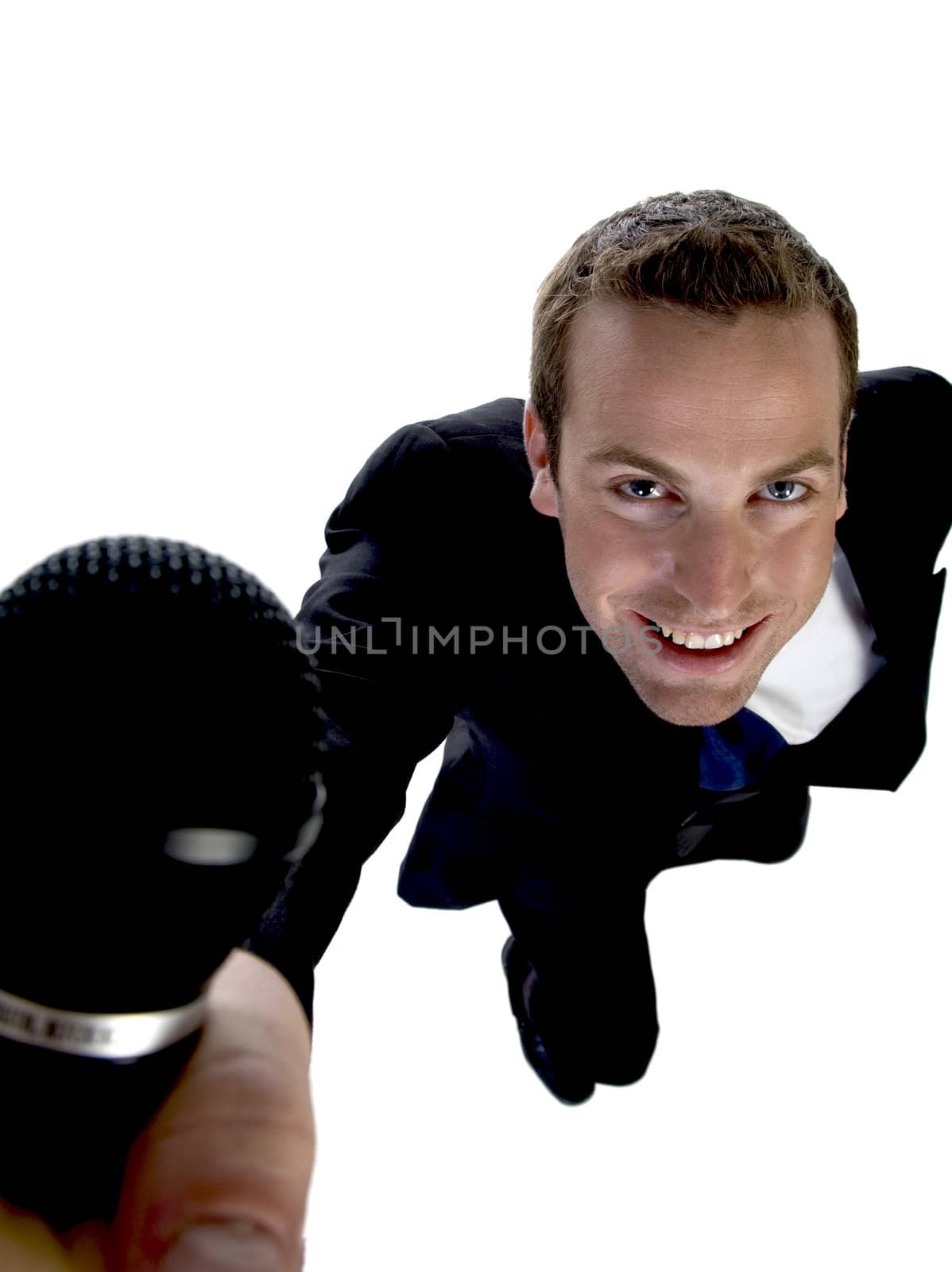 businessman showing his mic by imagerymajestic