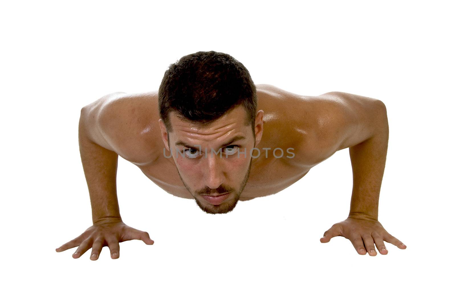 muscle man at workout  on an isolated background