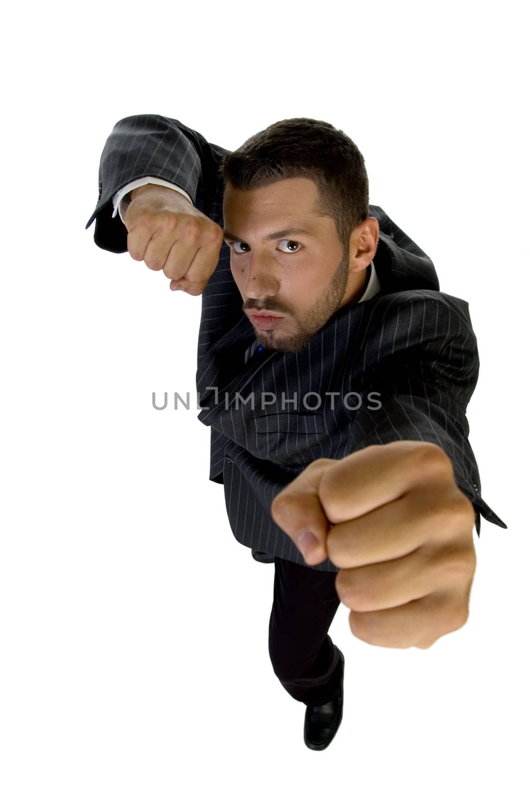 businessman showing punch on an isolated white  background